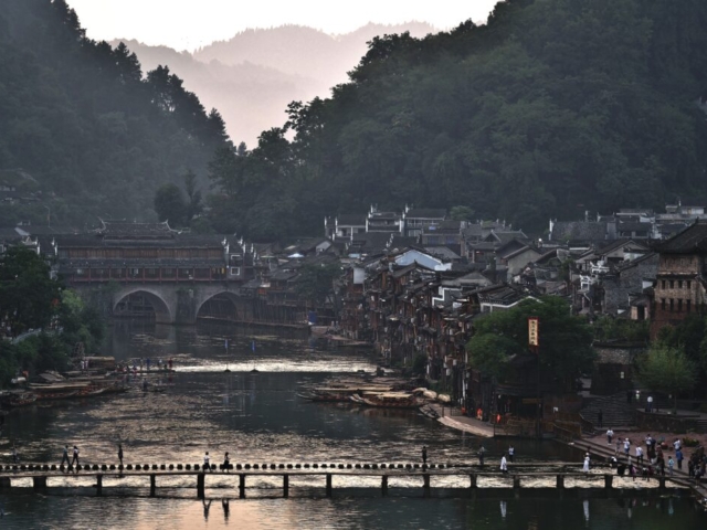 Rainbow Bridge (background) early in the morning, Fenghuang Ancient Town, Hunan, China