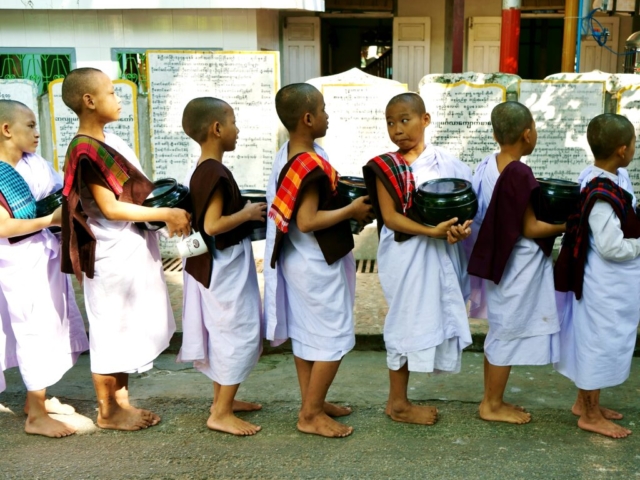 Young monks from lunch queue, Mahargandaryone Monastery, Amarapura, Mandalay, Burma