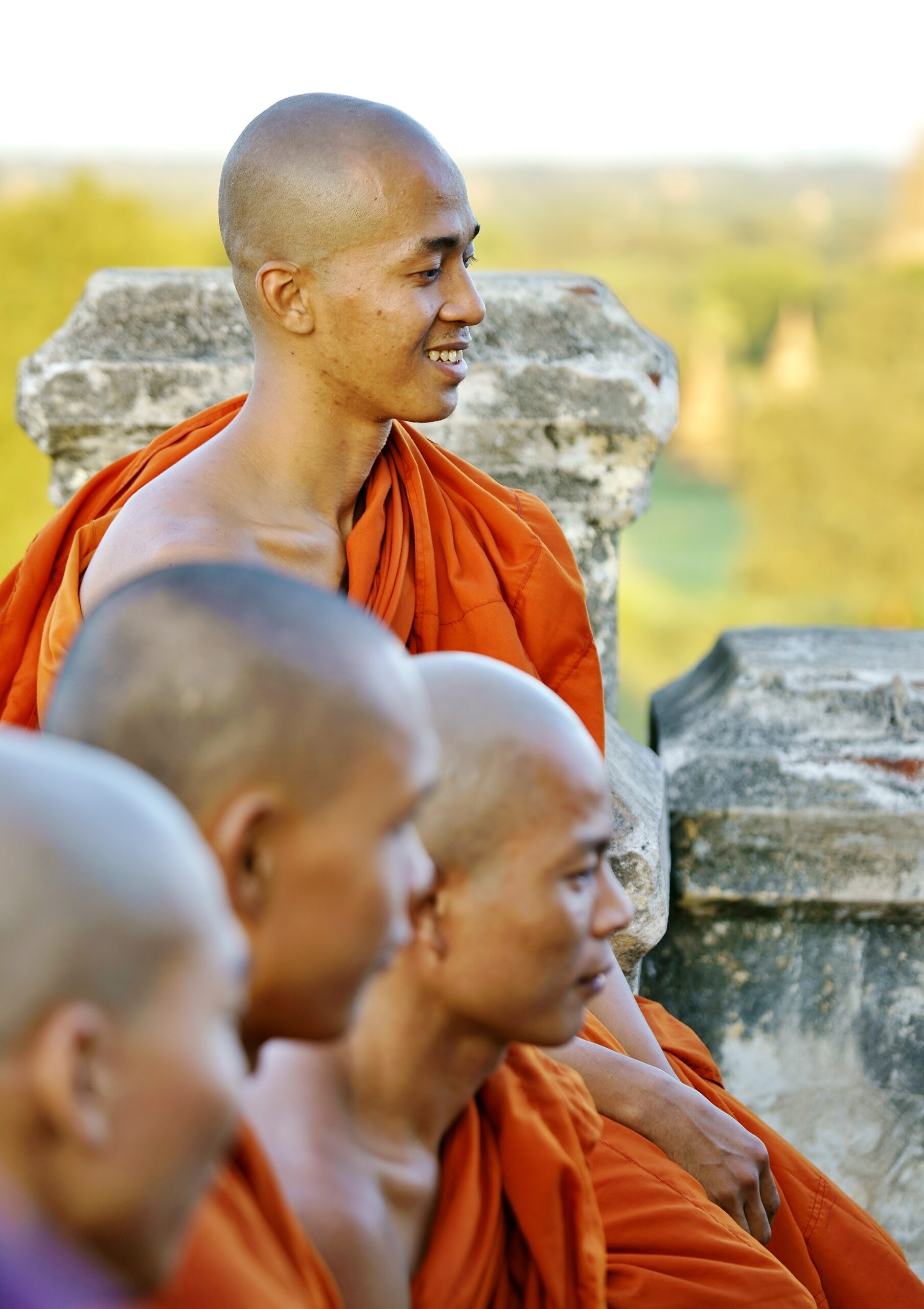 Joyful and proud monks from so called sunset-pagoda Shwesandow in sunset, Old Bagan, Burma (Myanmar)