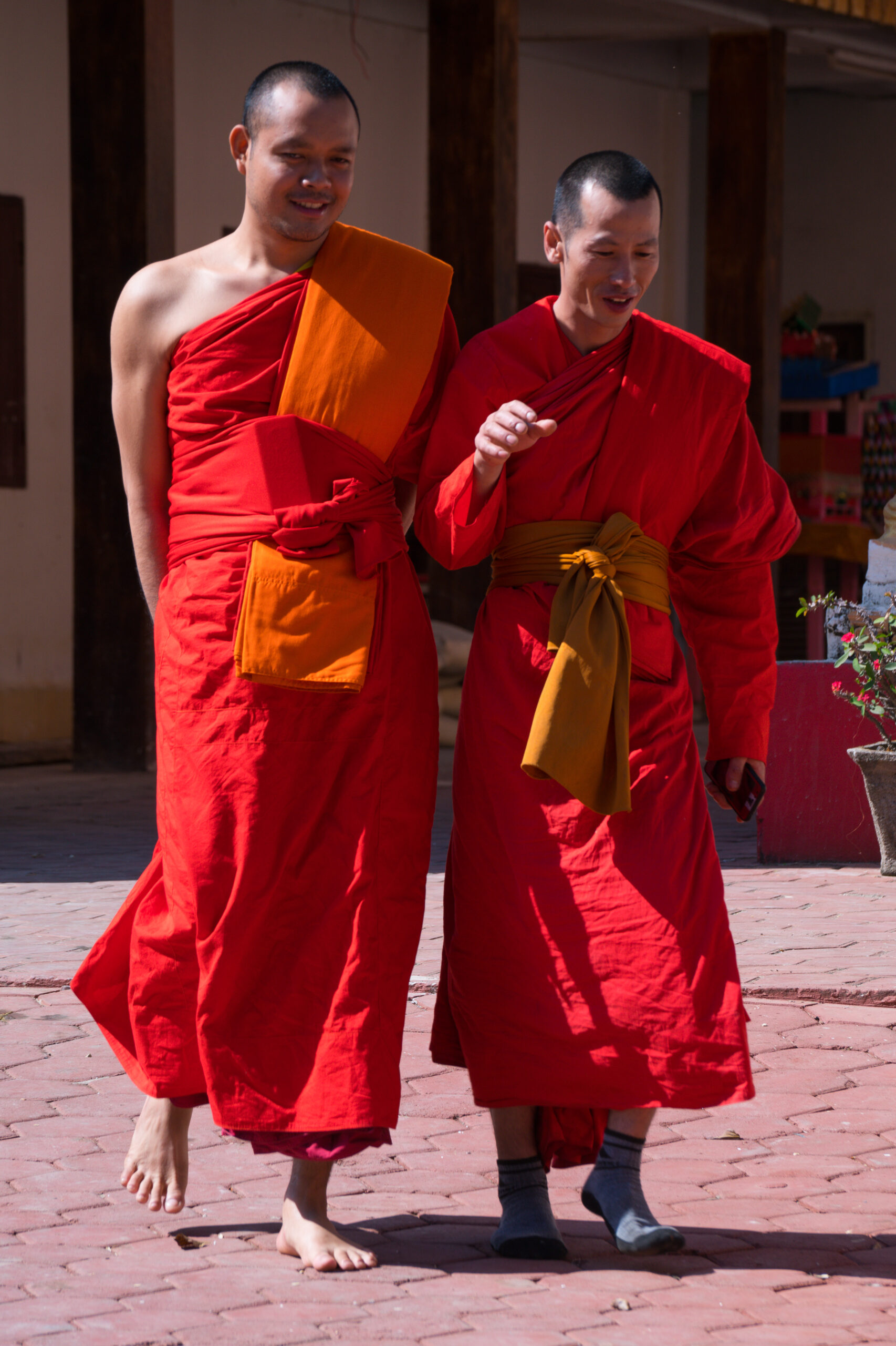 Colorful and happy monks in Vat That, Vang Vieng, Laos