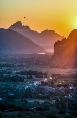 Ballooning in sunset a December day in Nathong Vally, Vang Vieng, Laos
